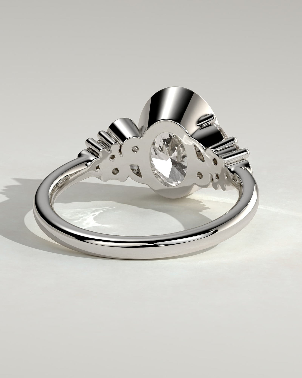 Isabella - Oval Bezel Solitaire with Clustered Round-Marquise Mixed Set Shoulder Stones Engagement Ring - White Gold
