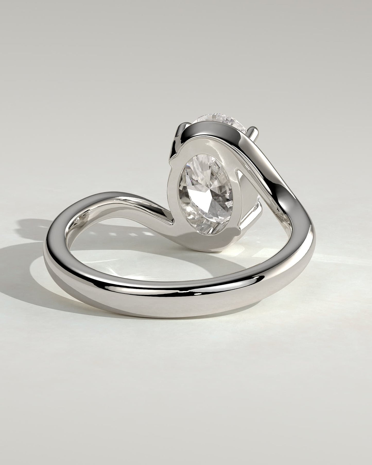 Kala - Oval Claw Solitaire with Bypass Band Engagement Ring - White Gold