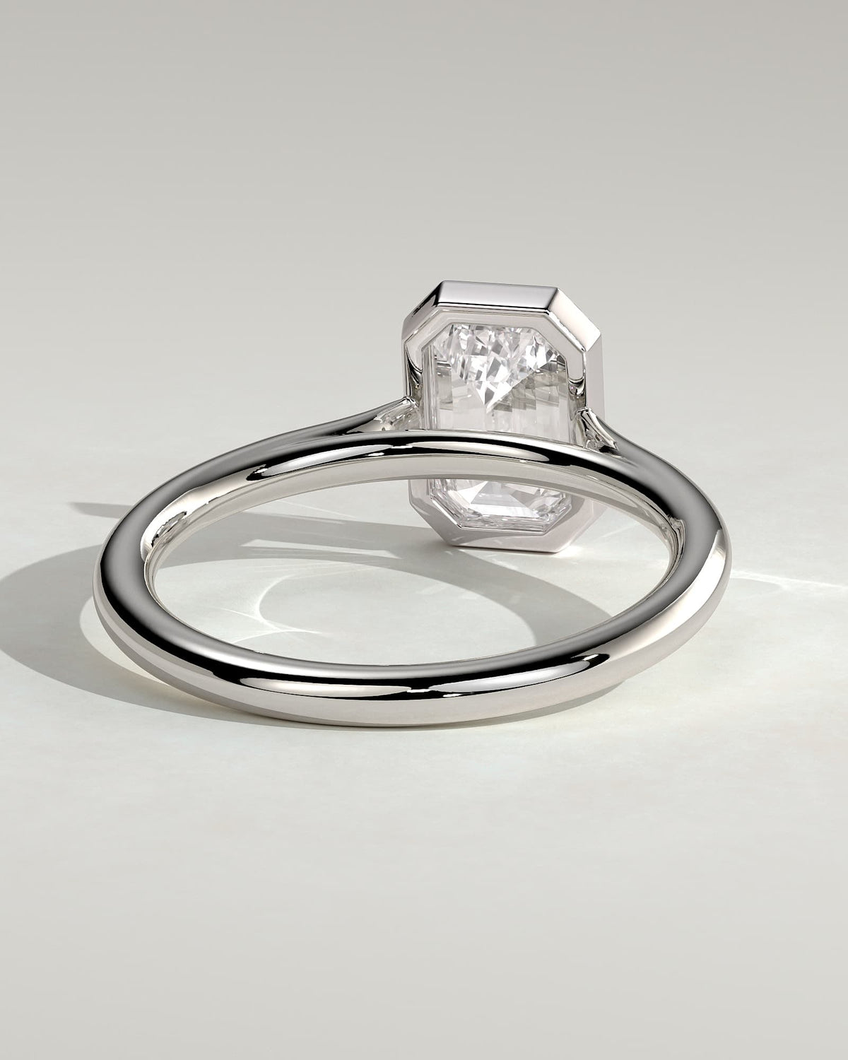 Journee - Statement Emerald Bezel Solitaire with Open Cathedral High Setting Engagement Ring - White Gold