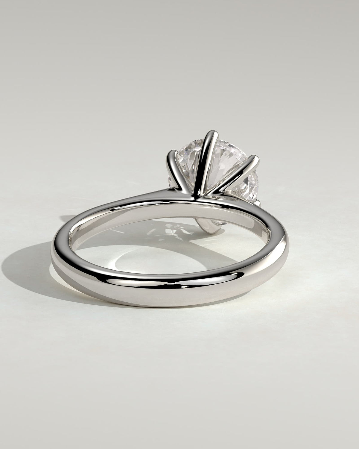 Jacqueline - Round Claw Solitaire with Solid Cathedral Low Setting Engagement Ring - White Gold