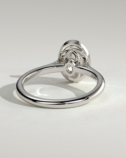 Gemma - Oval Bezel Solitaire with Twisted Gallery Engagement Ring - Platinum