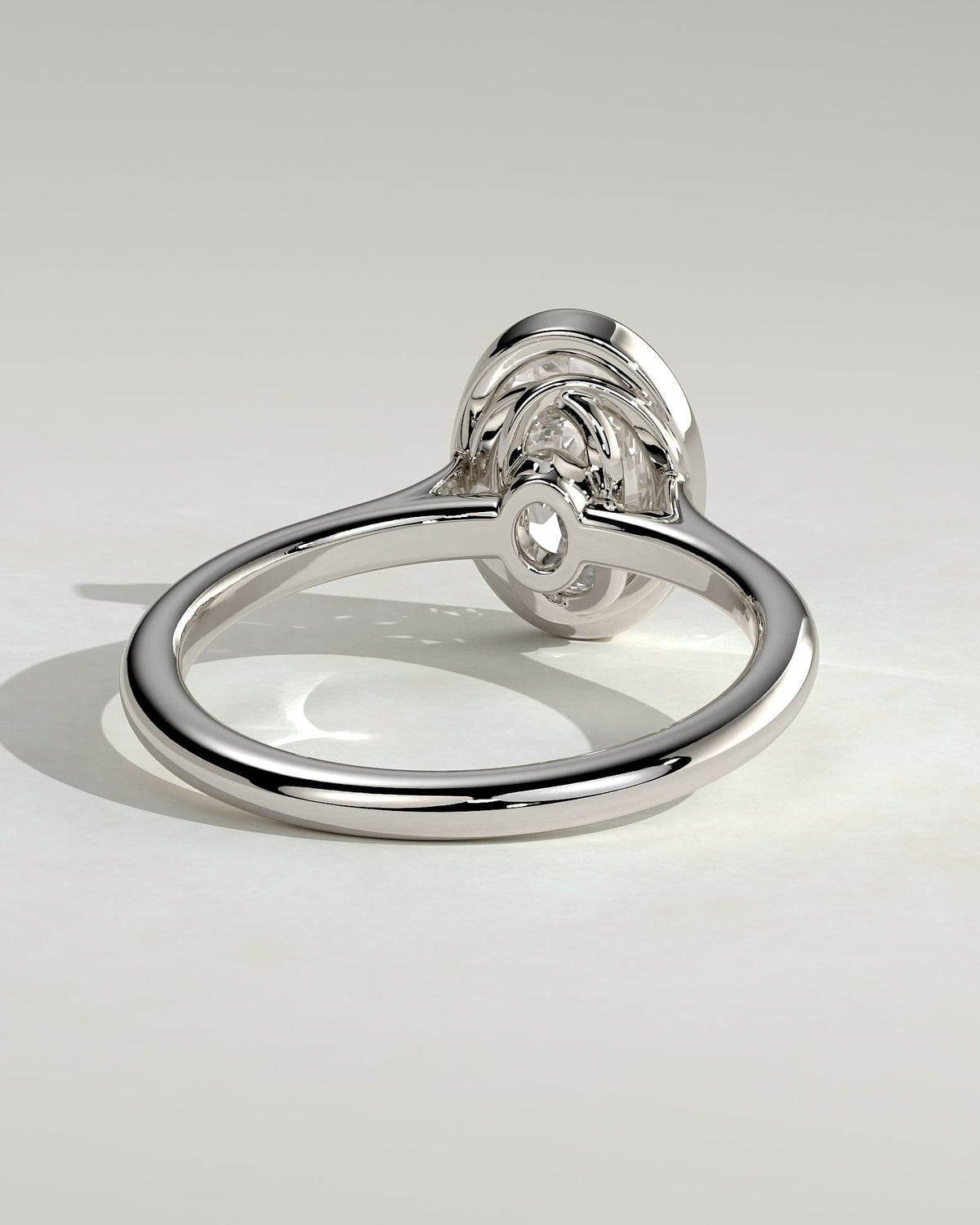 Gemma - Oval Bezel Solitaire with Twisted Gallery Engagement Ring - White Gold