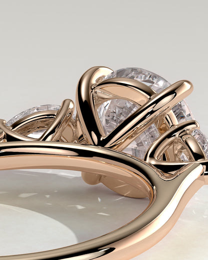 Arya - Round Claw Trilogy with Pear Side Stones and Cathedral Setting Engagement Ring - Rose Gold