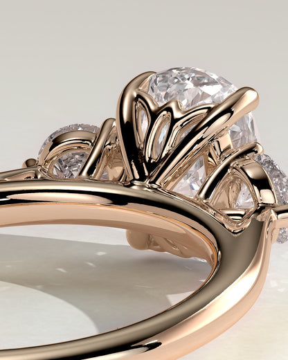 Charmaine - Elongated Cushion Claw Trilogy with Round Side Stones and Lily Detail Engagement Ring - Rose Gold