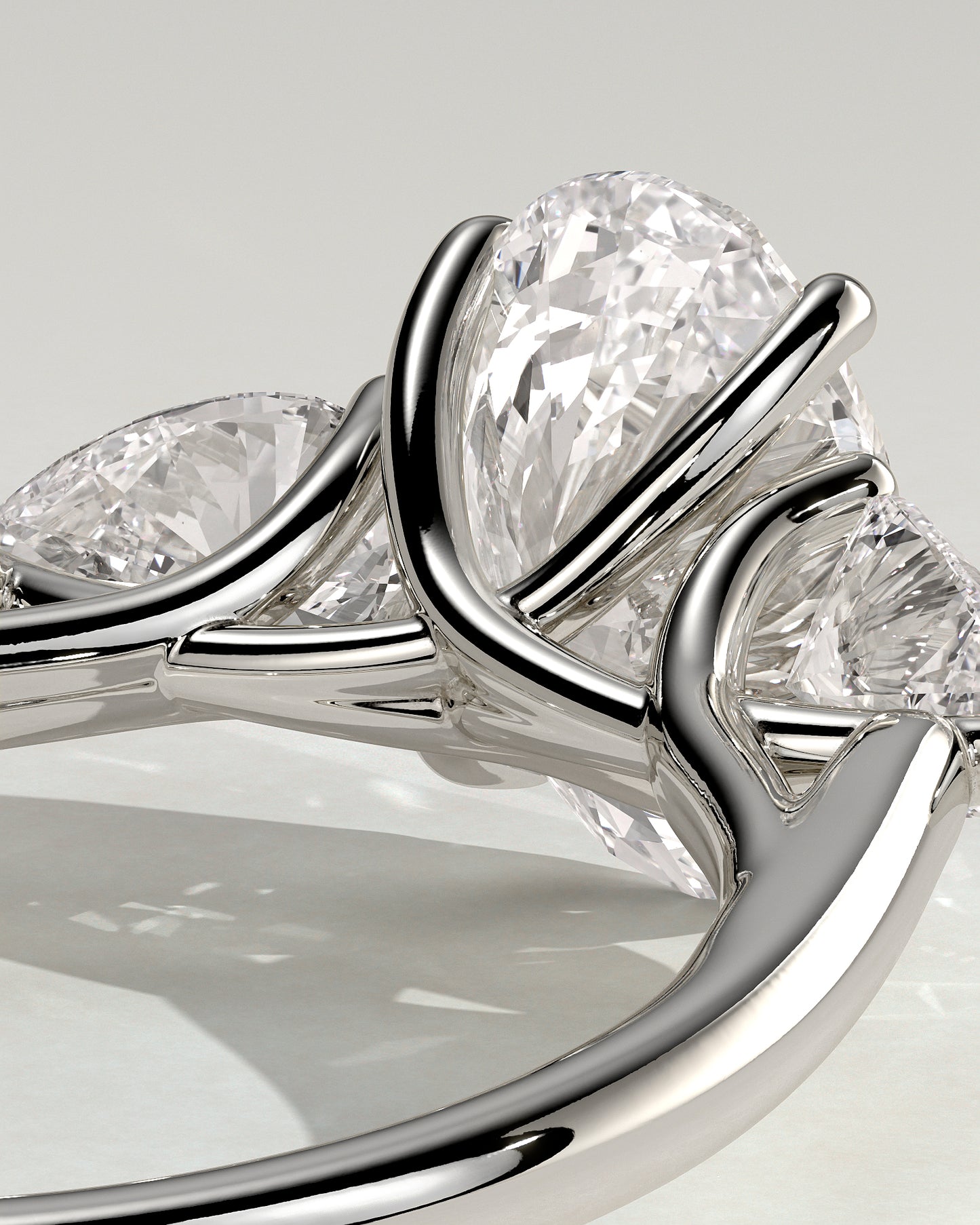 Amara - Oval Claw Trilogy with Pear Side Stones and Open Trellis Gallery Engagement Ring - Platinum - White Gold / Platinum 2ct