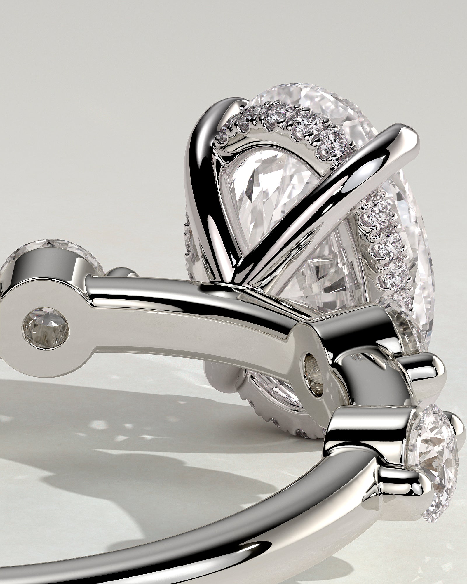 Arwen - Oval Claw Solitaire with 4 Spaced Round Accent Stones and Hidden Halo Engagement Ring - Platinum - White Gold / Platinum 2ct