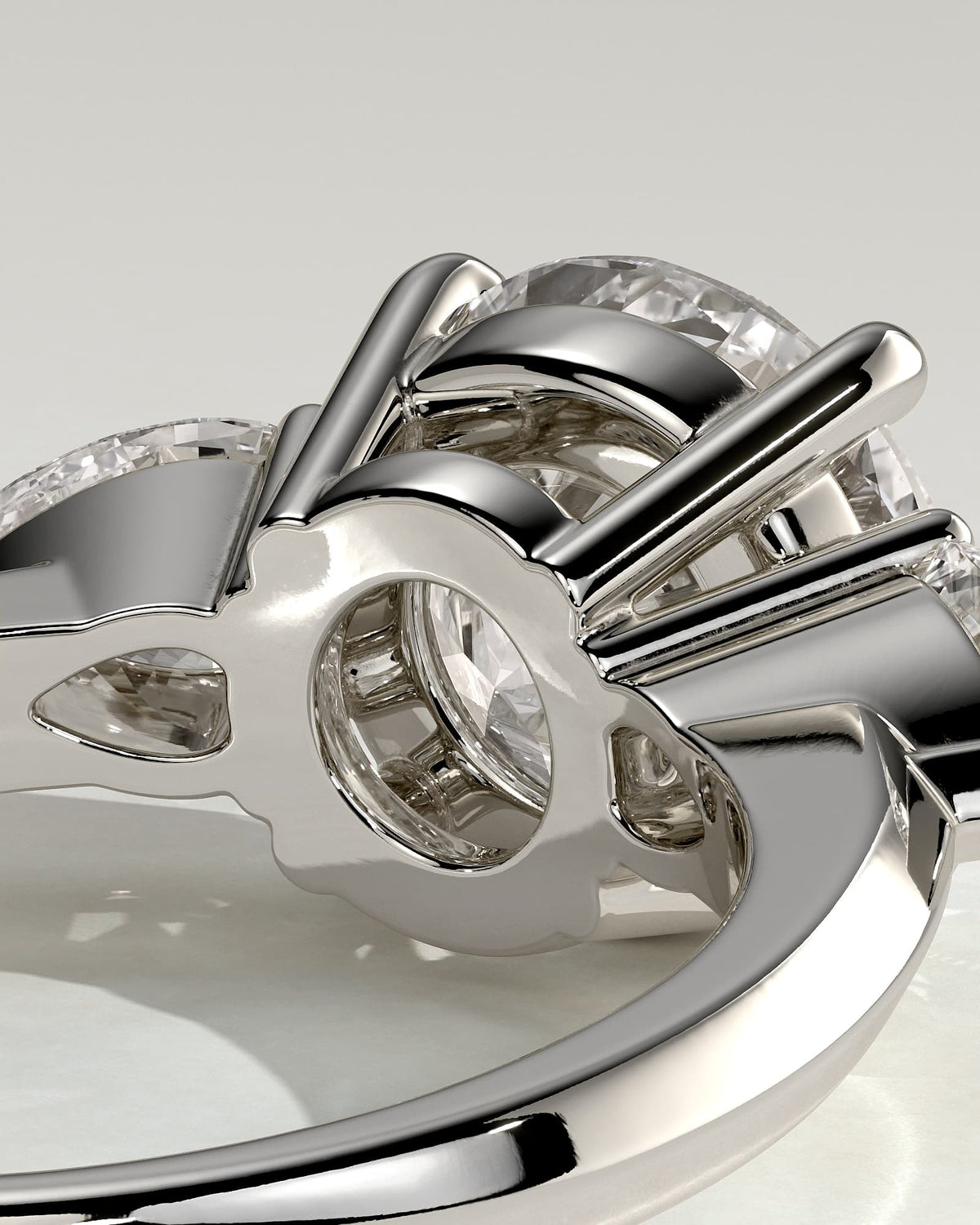 Halle - Round Claw Trilogy with Pear Side Stones and Knife Edge Band Engagement Ring - White Gold