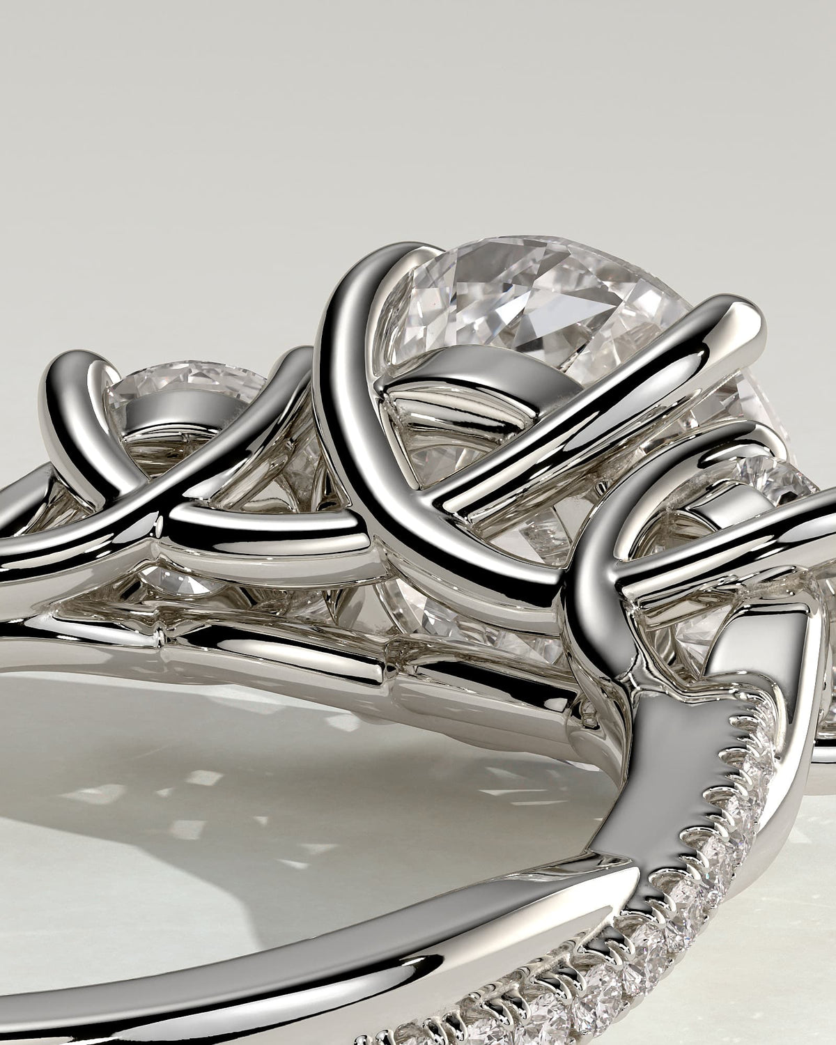Jaylene - Round Claw Trilogy with Round Side Stones, Twisted Pave Band and Trellis Gallery Engagement Ring - Platinum