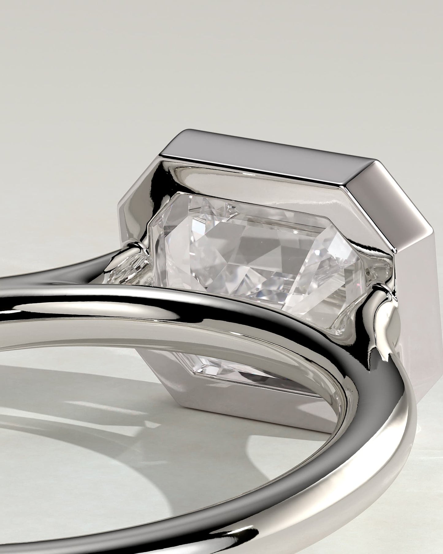Olive - Statement Emerald East West Bezel Solitaire with Open Cathedral High Setting Engagement Ring - Platinum