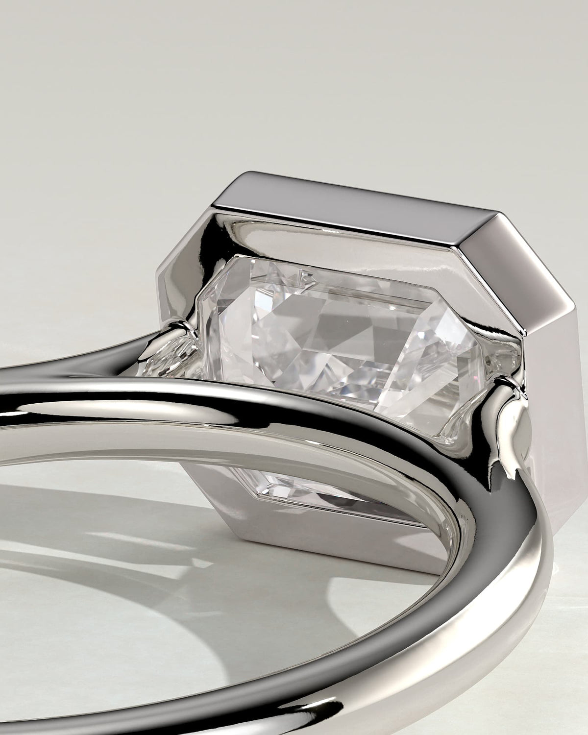 Olive - Statement Emerald East West Bezel Solitaire with Open Cathedral High Setting Engagement Ring - White Gold