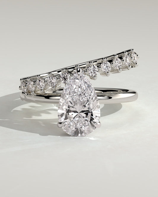 Xanthe - Pear Claw Solitaire with Double Plain-and-Round-Accent Stones Band Engagement Ring - Platinum