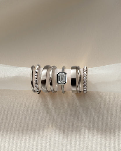 Olive - Statement Emerald East West Bezel Solitaire with Open Cathedral High Setting Engagement Ring - Platinum