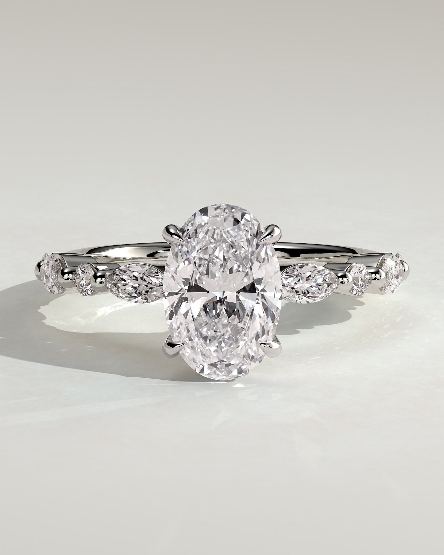 Alyssa - Oval Claw Solitaire with Marquise and Round Accent Stones Engagement Ring - White Gold - white gold - Lara Jewels
