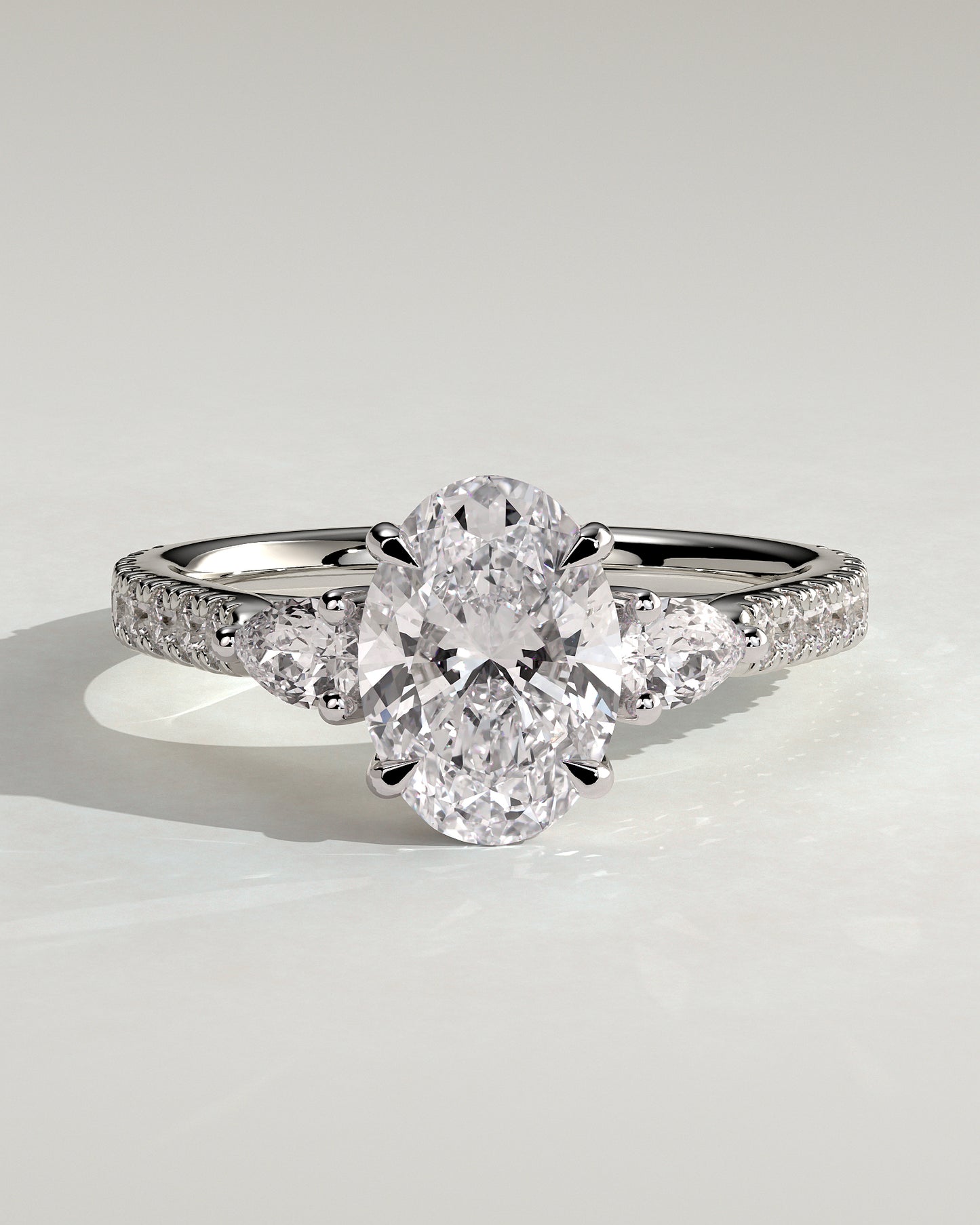 Arabella - Oval Claw Trilogy with Pear Side Stones and Pave Band Engagement Ring - Platinum - White Gold / Platinum 2ct