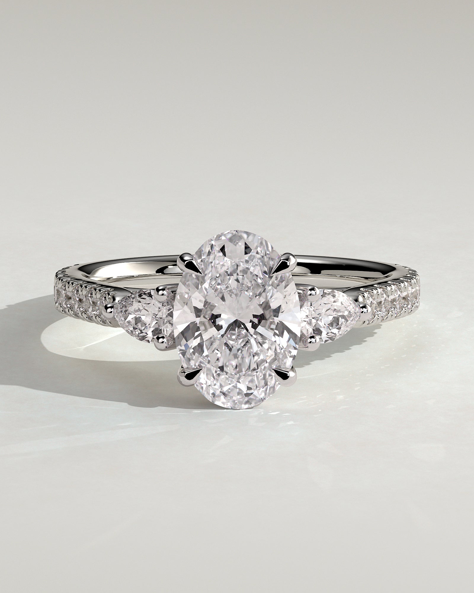 Arabella - Oval Claw Trilogy with Pear Side Stones and Pave Band Engagement Ring - Platinum - White Gold / Platinum 2ct