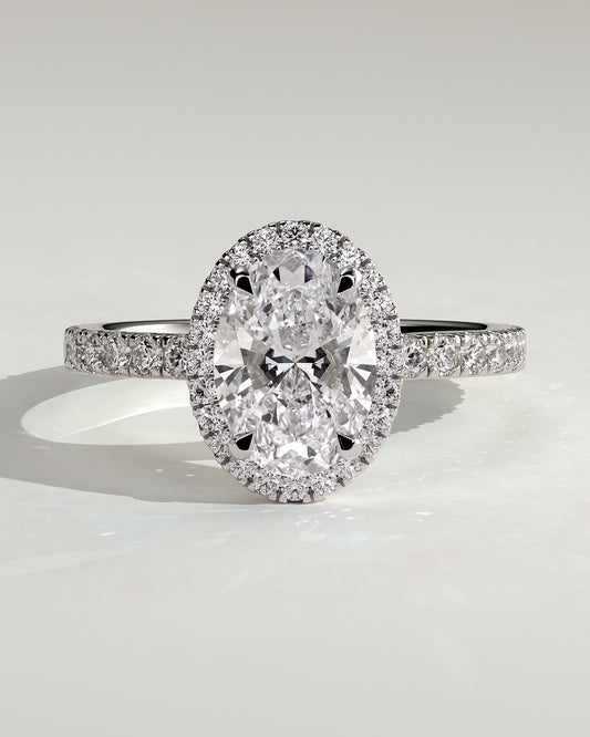 Aurora - Oval Claw Solitaire with Halo and Pave Band Engagement Ring - Platinum