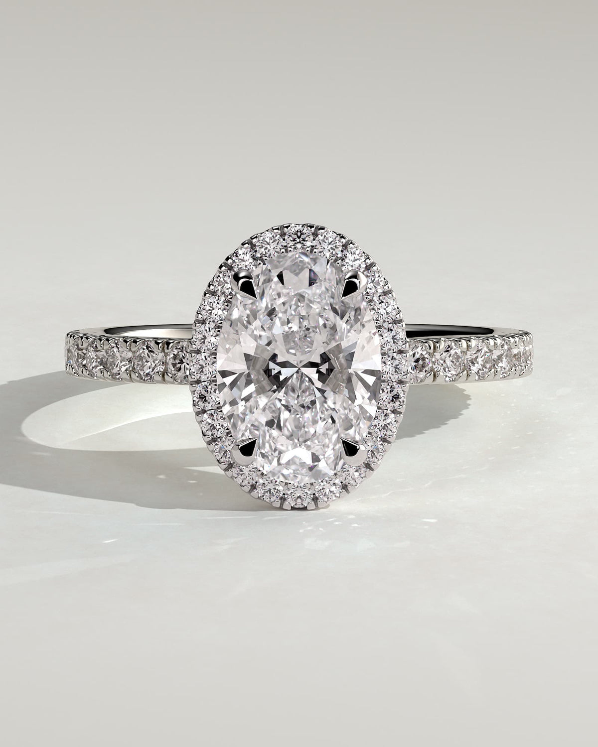 Aurora - Oval Claw Solitaire with Halo and Pave Band Engagement Ring - White Gold