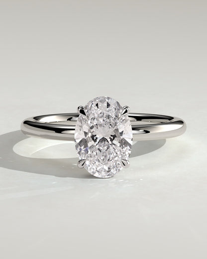 Cecilia - Oval Claw Solitaire with Wrap Around Hidden Halo Engagement Ring - White Gold