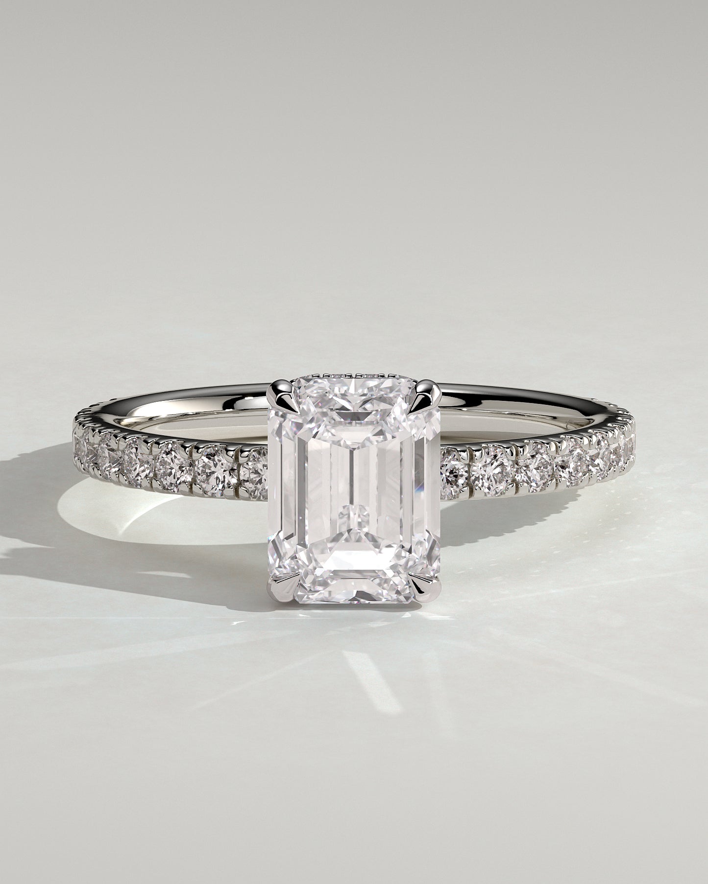 Eliana - Emerald Claw Solitaire with Wrap Around Hidden Halo and Pave Band Engagement Ring - Platinum - White Gold / Platinum 2ct
