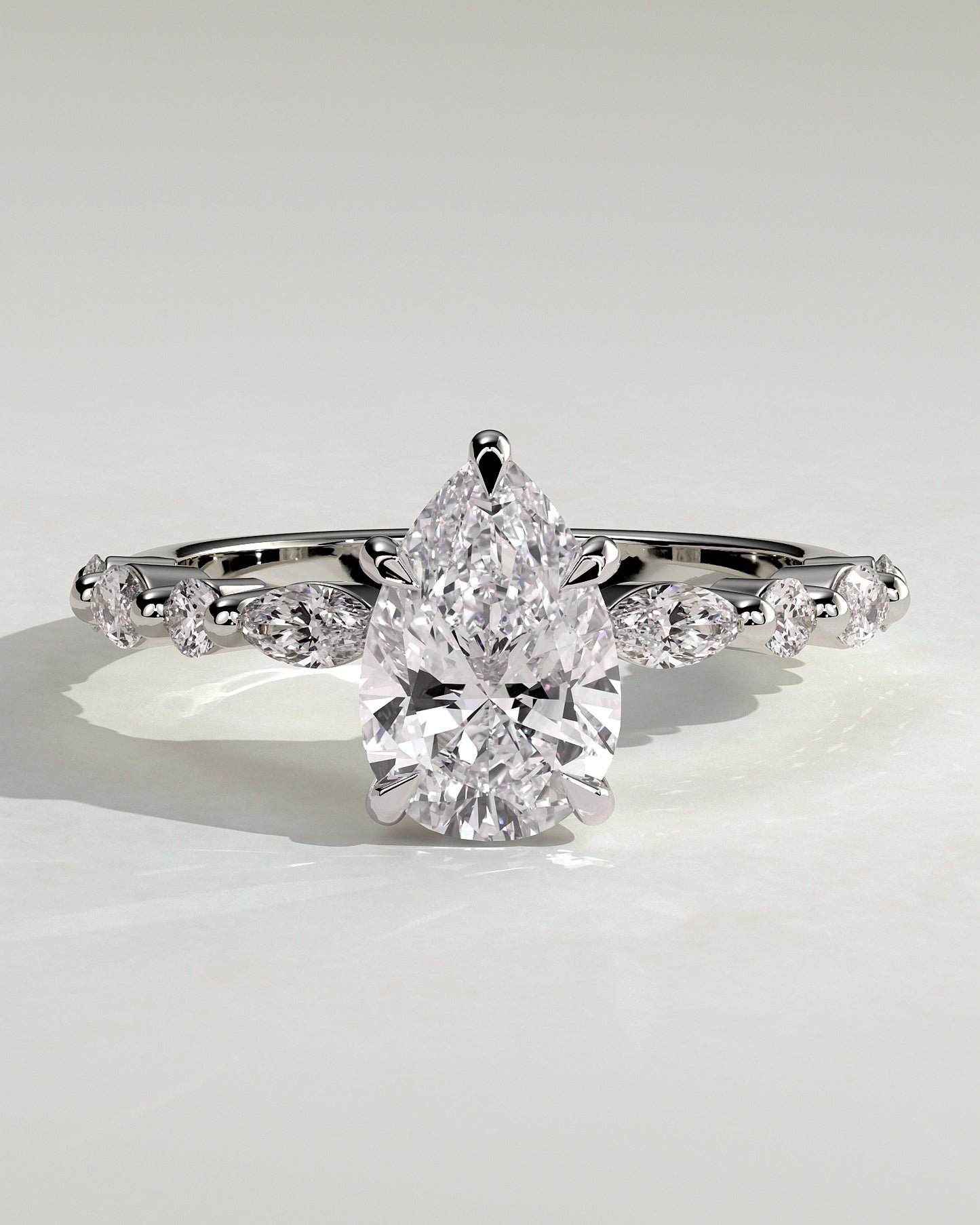 Jacinta - Pear Claw Solitaire with Marquise and Round Accent Stones Engagement Ring - Platinum - White Gold / Platinum 2ct