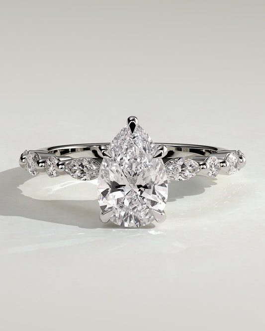 Jacinta - Pear Claw Solitaire with Marquise and Round Accent Stones Engagement Ring - Platinum