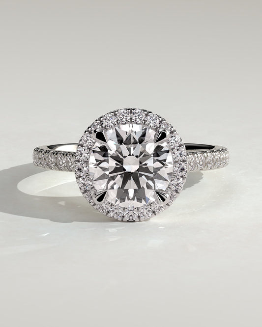 Leah - Round Claw Solitaire with Halo and Pave Band and Cathedral High Setting Engagement Ring - Platinum