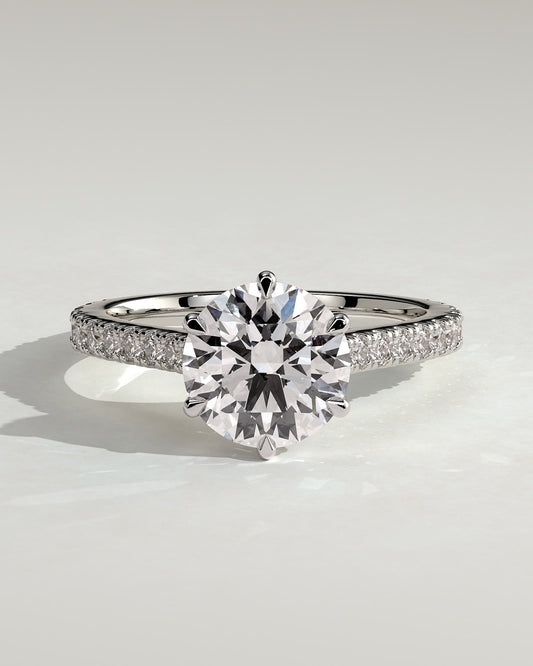 Maisy - Round Claw Solitaire with Pave Band and Cathedral High Setting Engagement Ring - Platinum