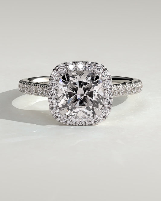 Nicole - Cushion Claw Solitaire with Halo and Pave Band and Cathedral High Setting Engagement Ring - Platinum
