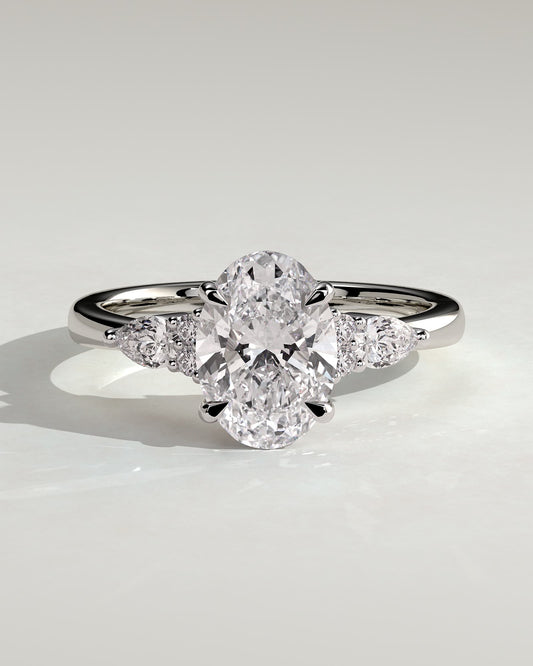 Sheridan - Oval Claw Solitaire with Pear Accents and Round Shoulder Stones Engagement Ring - Platinum