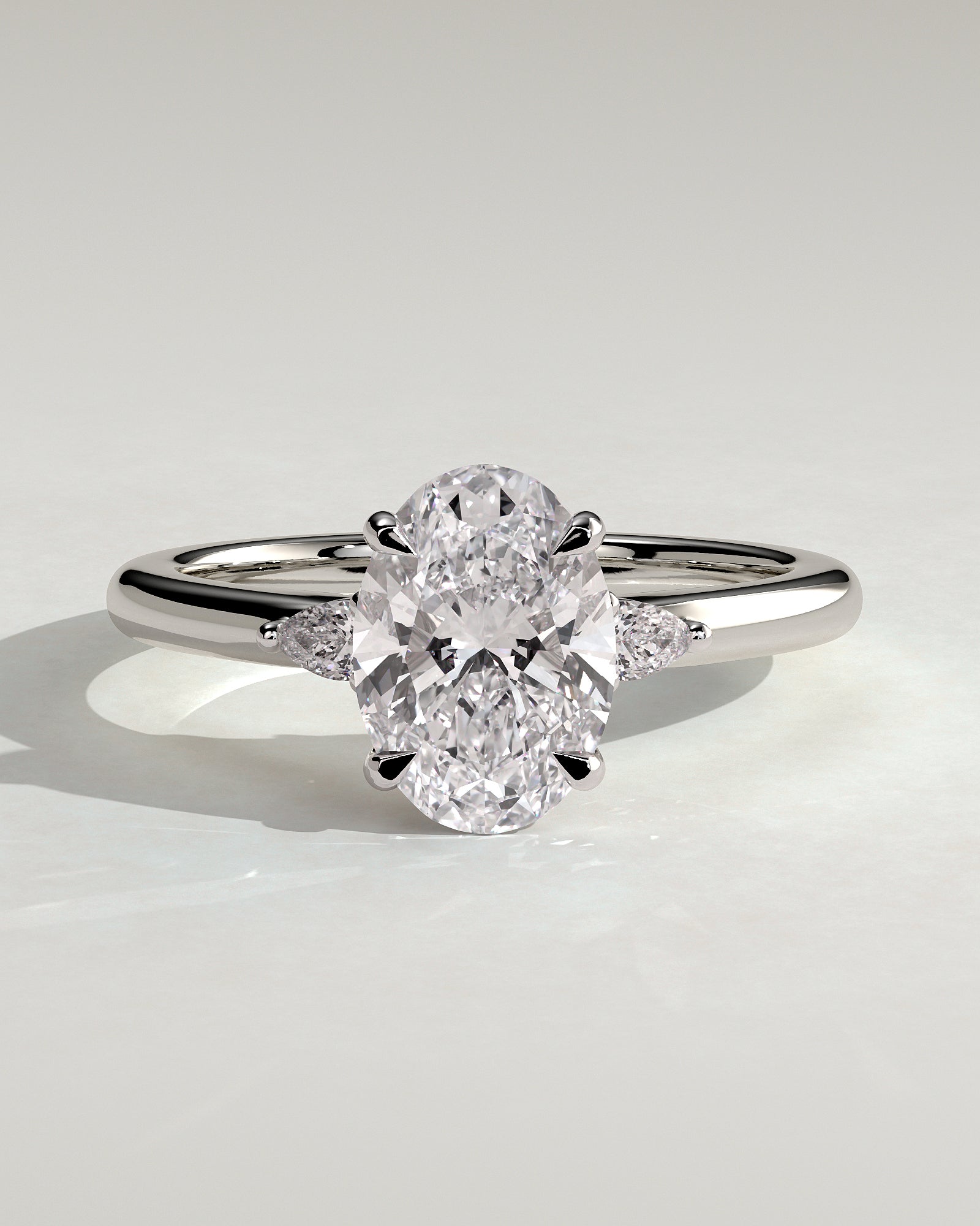 Elena - Oval Claw Trilogy with Pear Side Stones and Tulip Detail Engagement Ring - Platinum - White Gold / Platinum 2ct