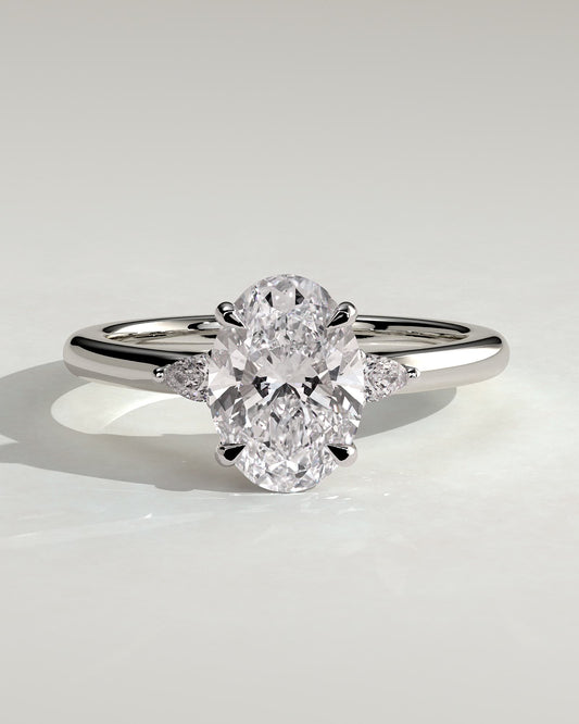 Elena - Oval Claw Trilogy with Pear Side Stones and Tulip Detail Engagement Ring - White Gold