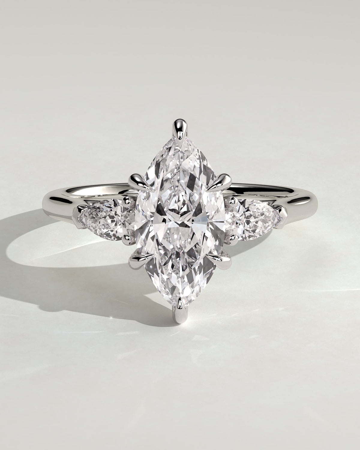 Chantelle - Marquise Claw Trilogy with Pear Side Stones and Cathedral Setting Engagement Ring - White Gold