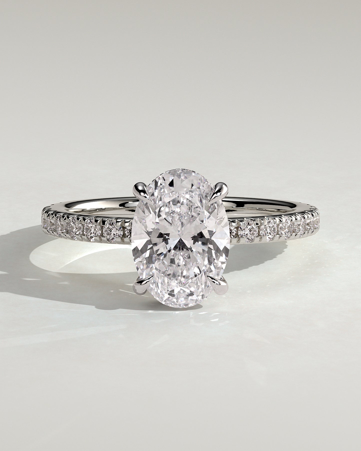 Evangeline - Oval Claw Solitaire with Wrap Around Hidden Halo and Pave Band Engagement Ring - Platinum - White Gold / Platinum 2ct