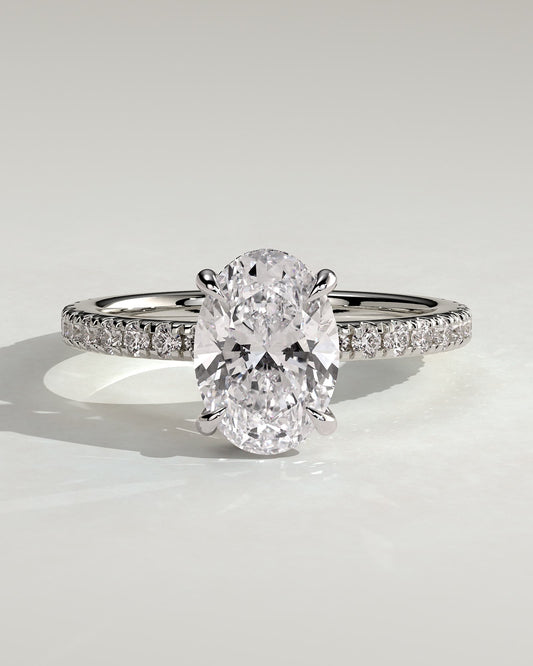 Evangeline - Oval Claw Solitaire with Wrap Around Hidden Halo and Pave Band Engagement Ring - Platinum