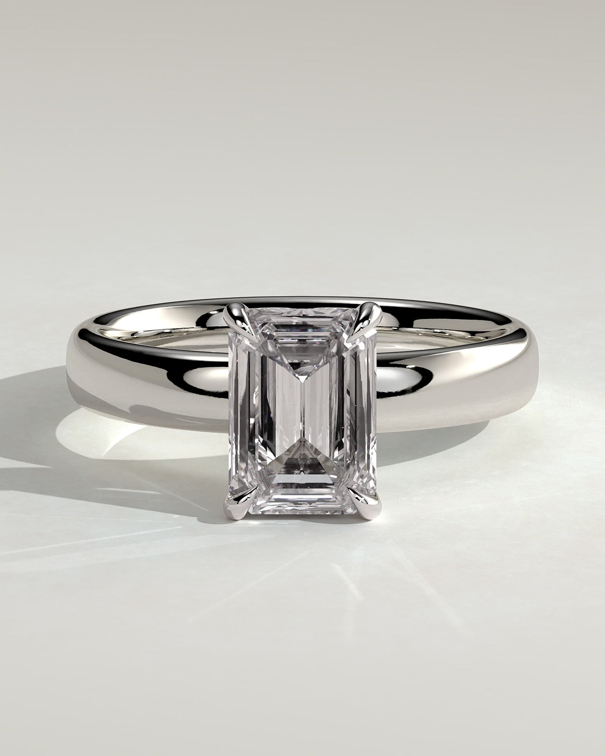 Kate - Emerald Claw Solitaire with Cigar Band and Hidden Halo Engagement Ring - Platinum