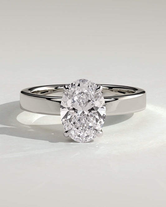 Nikita - Oval Claw Solitaire with Flat Cigar Band and Hidden Halo Engagement Ring - Platinum