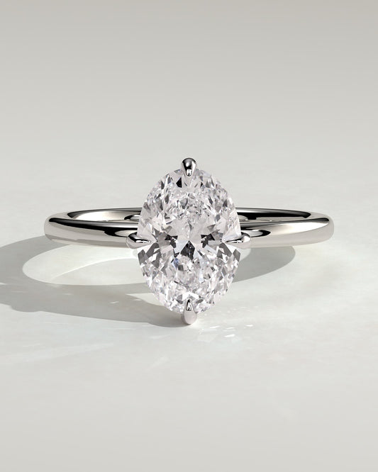 Spencer - Oval Claw Solitaire with Hidden Halo and Compass Rotation  Engagement Ring - Platinum