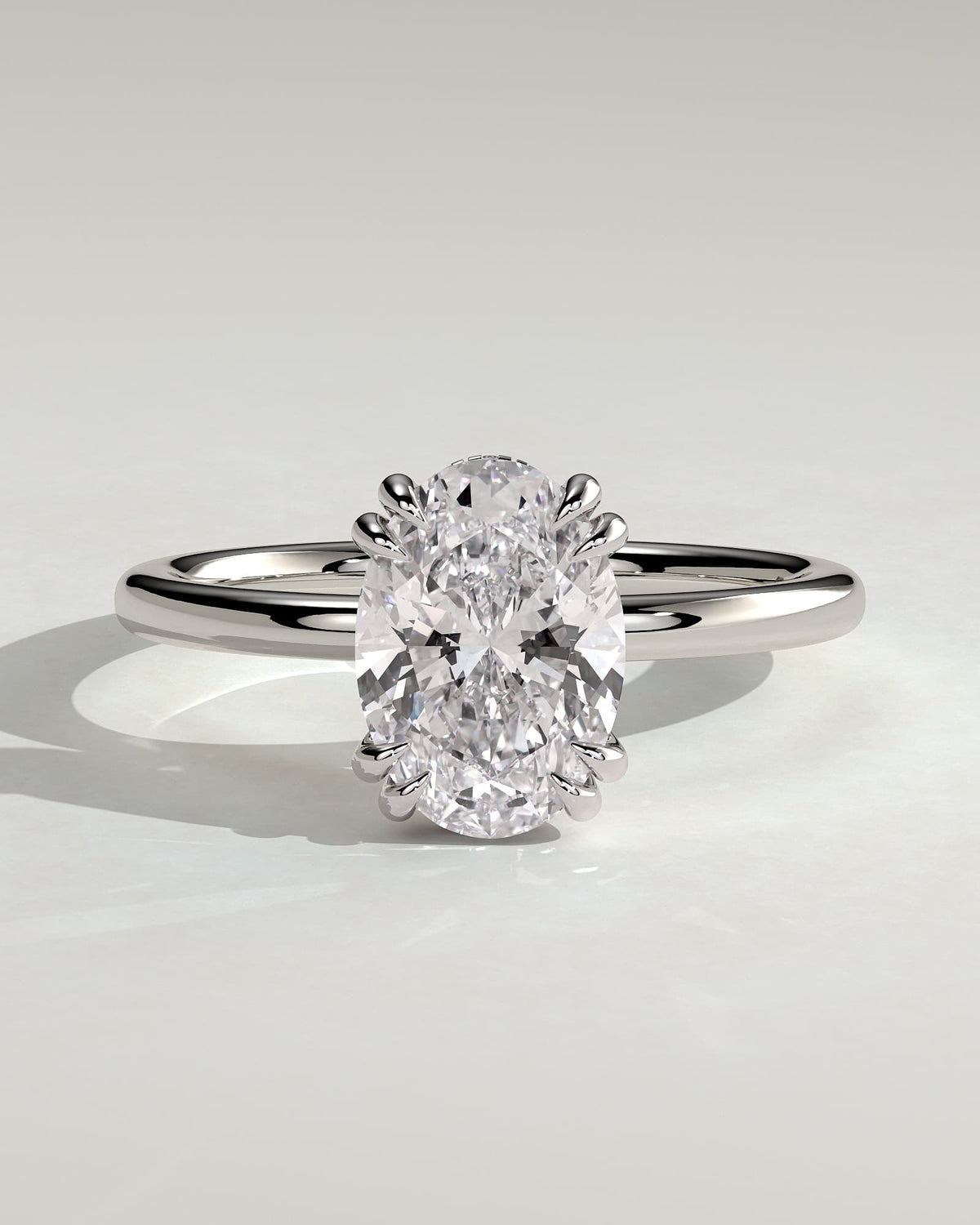 Avery - Oval Double Claw Solitaire with Hidden Halo Engagement Ring - White Gold