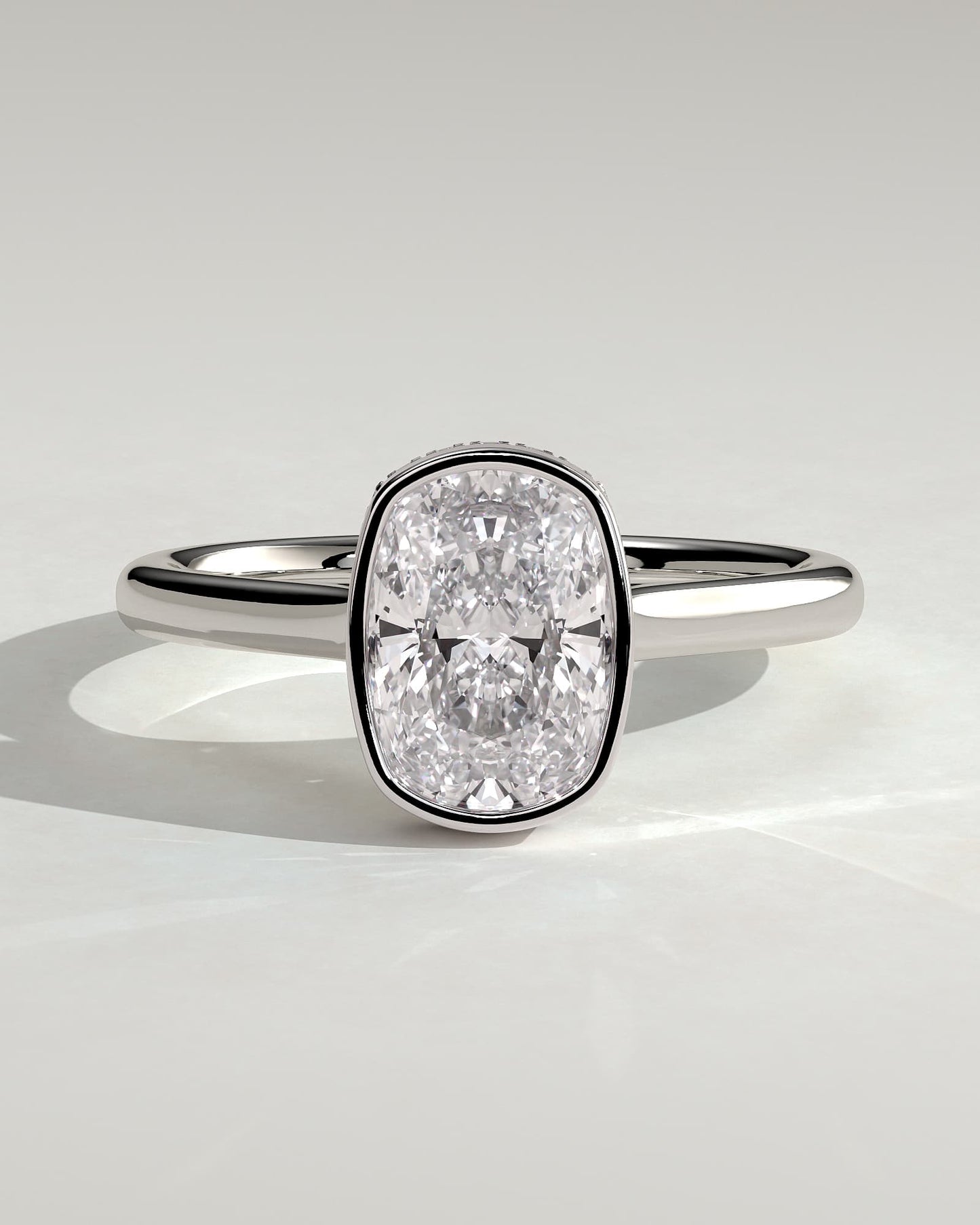 Everleigh - Elongated Cushion Bezel Solitaire with Hidden Halo and Cathedral High Setting Engagement Ring - White Gold