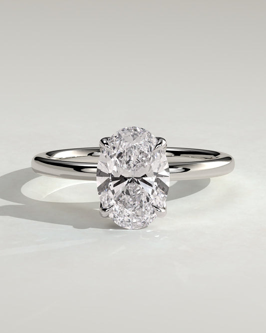 Ivy - Oval Claw Solitaire with Petal Gallery and Accented Tiara Detail Engagement Ring - White Gold