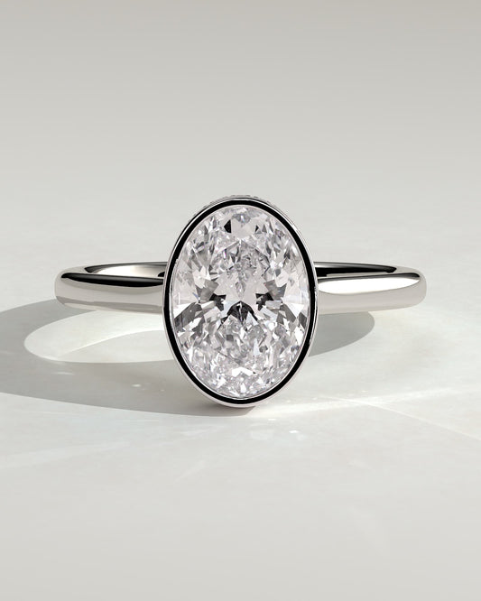 Sierra - Oval Bezel Solitaire with Hidden Halo and Cathedral High Setting Engagement Ring - Platinum