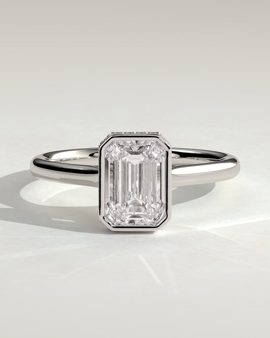 Valeria - Emerald Bezel Solitaire with Hidden Halo and Cathedral High Setting Engagement Ring - White Gold