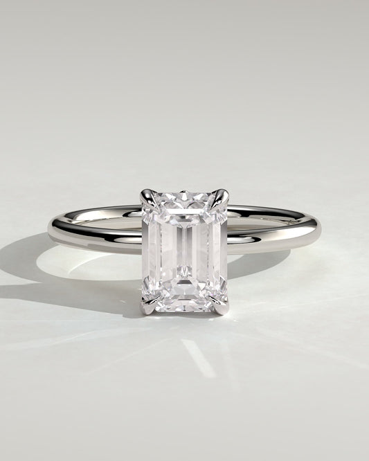 Dove - Emerald Claw Solitaire with Petal Gallery and Accent Leaf Detail Engagement Ring - White Gold