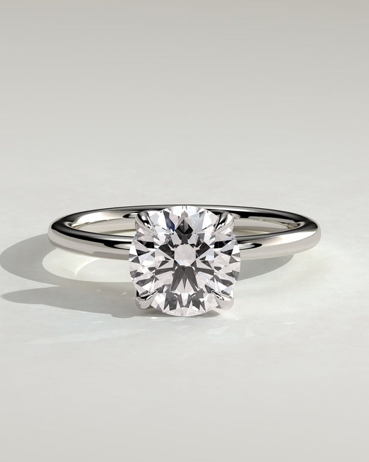 Joy - Round Claw Solitaire with Petal Gallery and Accent Leaf Detail Engagement Ring - White Gold