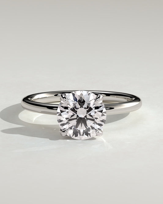 Brianna - Round Claw Solitaire with Petal Gallery, Accent Leaf Detail and Cathedral Setting Engagement Ring - Platinum