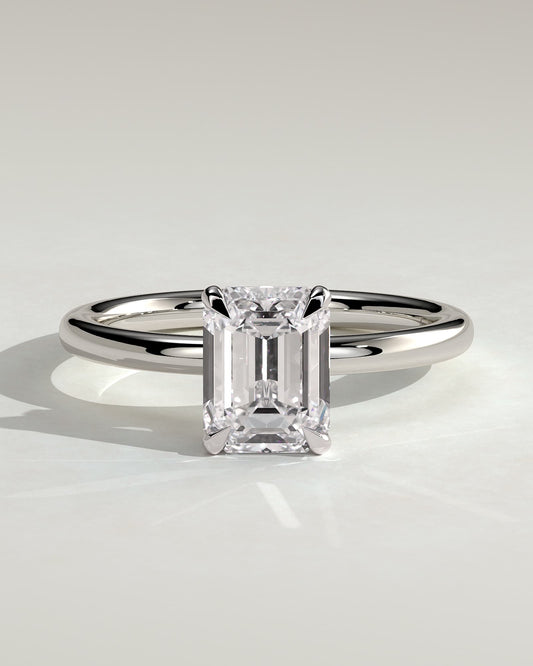 Miller - Emerald Claw Solitaire with Wrap Around Hidden Halo Engagement Ring - Platinum