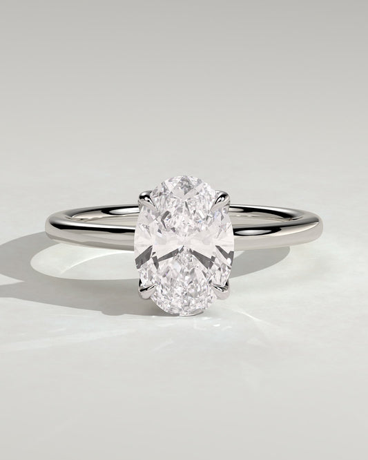 Erica - Oval Claw Solitaire with Petal Gallery, Accent Leaf Detail and Cathedral Setting Engagement Ring - Platinum