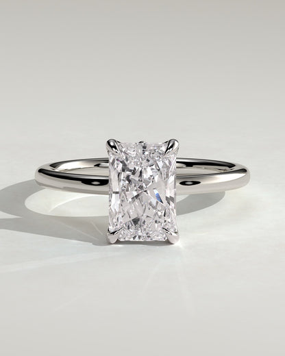 Harriet - Radiant Claw Solitaire with Petal Gallery, Accent Leaf Detail and Cathedral Setting Engagement Ring - Platinum