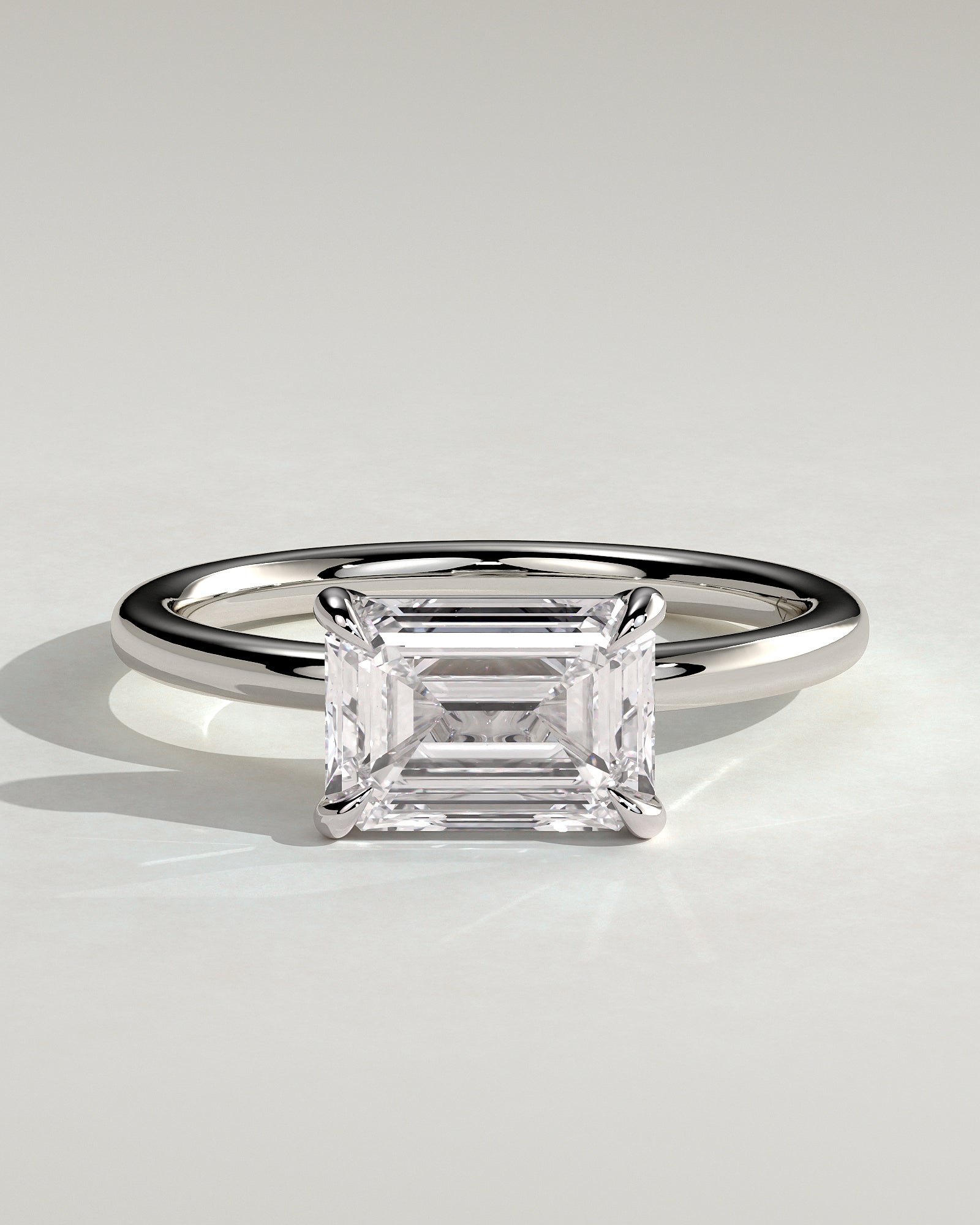 Debbie - Emerald East West Claw Solitaire Engagement Ring - Platinum - White Gold / Platinum 2ct