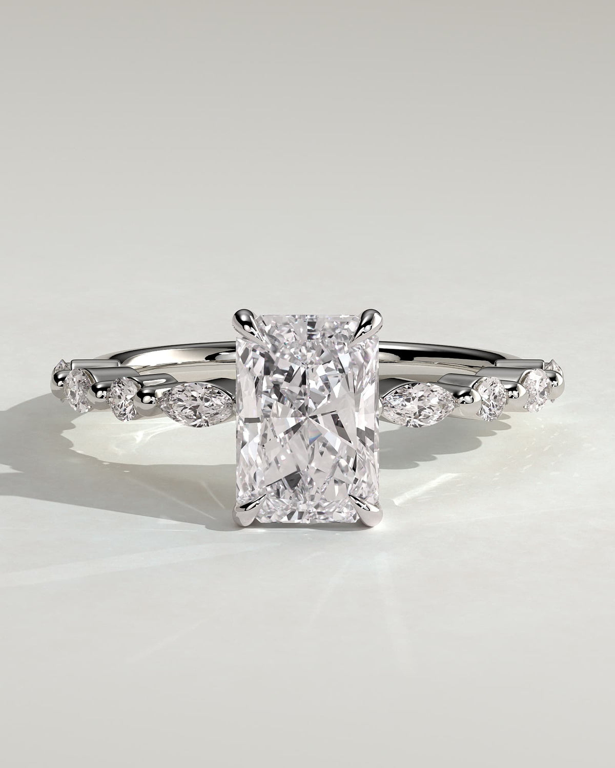 Dayna - Radiant Claw Solitaire with Marquise and Round Accent Stones Engagement Ring - White Gold